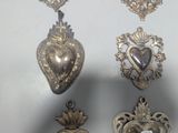 a lot of silver items that are on a table