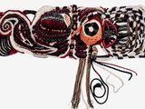 a picture of a piece of art with scissors and thread