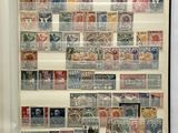 an open book with a lot of stamps on the pages