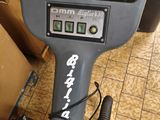 a machine that is sitting on the floor in the room