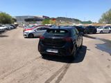 cars parked in a parking lot in a parking lot with lots of parked cars
