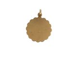 a gold plated pendant with a scallop design