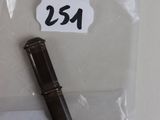 a small black pen and a small black pen in a plastic bag