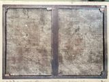 a picture of a window with a metal frame on it