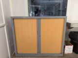 two doors that are open in a room