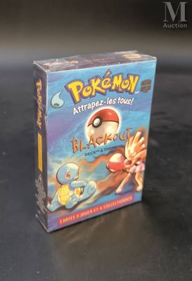 a box of pokemon cards sitting on a table