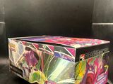 a close up of a box of pokemon cards on a table
