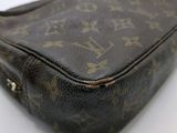 an image of a louis vuitton bag on a white surface