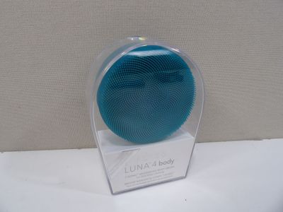 a small blue object in a clear box on a table