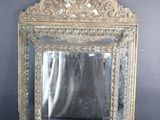 a mirror that is sitting on a table