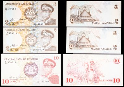 four different bank notes of different shapes and colors