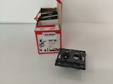 a box of tape on the floor next to a box of tape