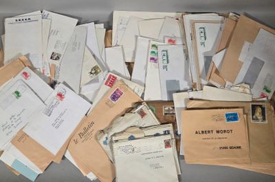 many mails and envelopes sitting on a table