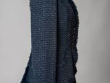a black jacket with fringes on a mannequin mannequin mannequin mannequin mann