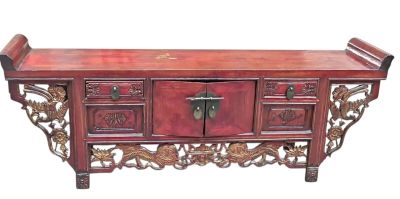 a wooden table with drawers and drawers on top of it