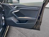 a car door open with the driver ' s seat down