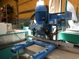 a machine that is sitting on a table in a warehouse