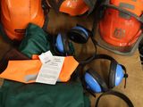 many different types of safety equipment laid out on the floor