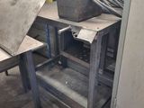 an image of a workbench with a laptop on it