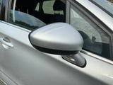 a car that has a mirror on the side of it