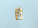 a picture of a gold pendant with a bird on it