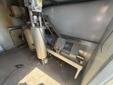 a machine that is sitting inside of a building