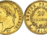 a gold coin with a woman ' s face on it