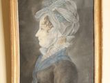 tableau représentant une femme portant un turban et une robe bleue