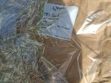 a plastic bag that has some kind of food in it