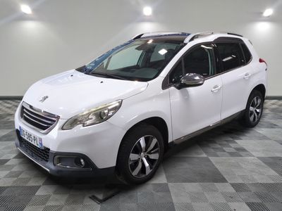 the white car is parked on a checkered floor in the garage