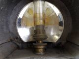 a metal pipe with a light inside of it