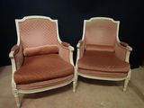 pair of antique french style armchairs with upholstered cushions