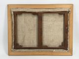 an old picture frame with two wooden frames on top of a white wall