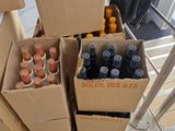 many boxes of bottles of wine on a carton