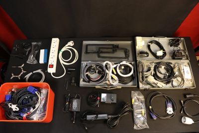 a table with a bunch of electronics on it