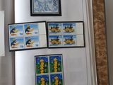 an open book with stamps on it and a picture of a snowboarder on it