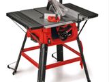 a close up of a table with a saw on it