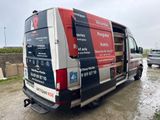 a van that is parked on the side of the road