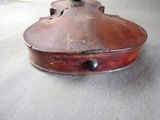 a violin that is sitting on the floor