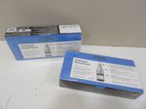 two boxes of blue and white adhesives on a white surface