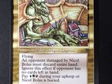 a close up of a card with a picture of a dragon on it