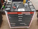 a workbench with tools on top of it in a garage
