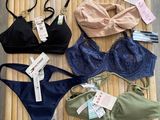 several bras are lined up on top of a bamboo mat