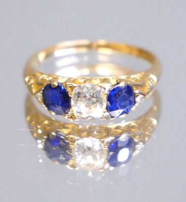 Bague jarretière en or jaune 750 millièmes centrée d'un diam…