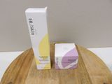 a picture of a box and a box of cream on a table