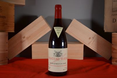 a bottle of wine that is sitting on a table