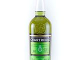 a close up of a bottle of chartreuse on a white background