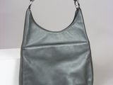 grey leather purse with chain handles on a white surface