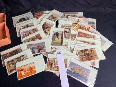 a pile of cards with pictures on them on a table