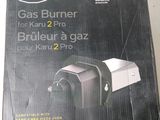 la boîte est ouverte pour montrer le contenu d'un brûleur à gaz